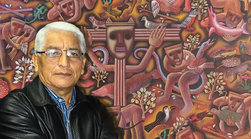 Víctor Salvo y una de sus obras detrás.